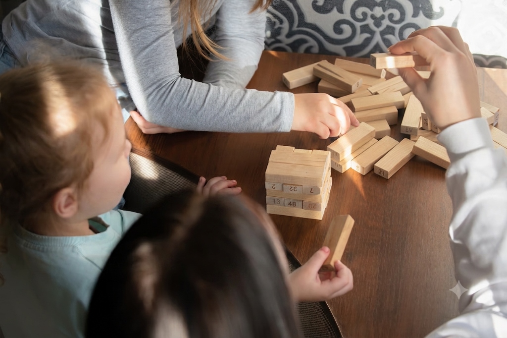 Children building and playing with wooden blocks together